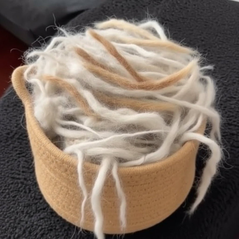 A basket full of pet fur removed with FurGlide
